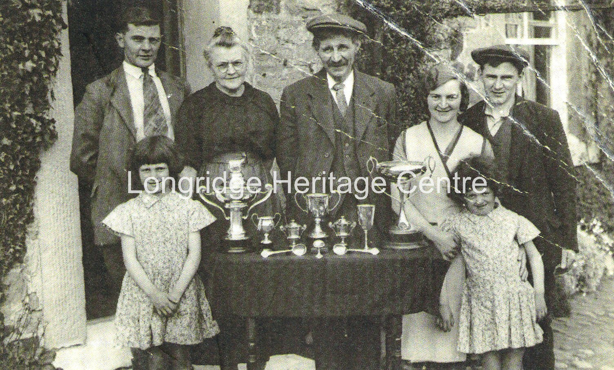430B - Lower College Farm, Hotherall - A family group of Walkers - 1932